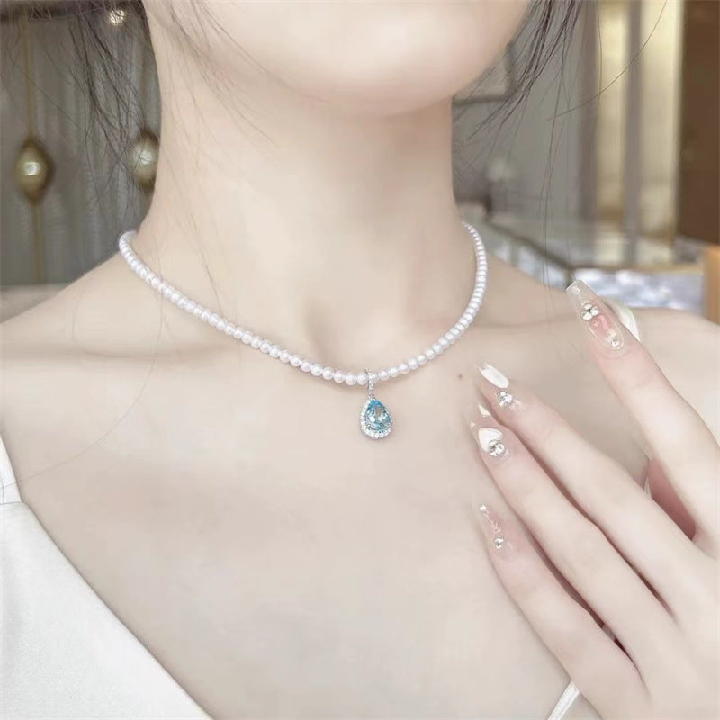 Colar de Perolas Moissanite com Gema Azul Celeste 2
