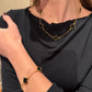 Conjunto com Trevos Pretos Dourados