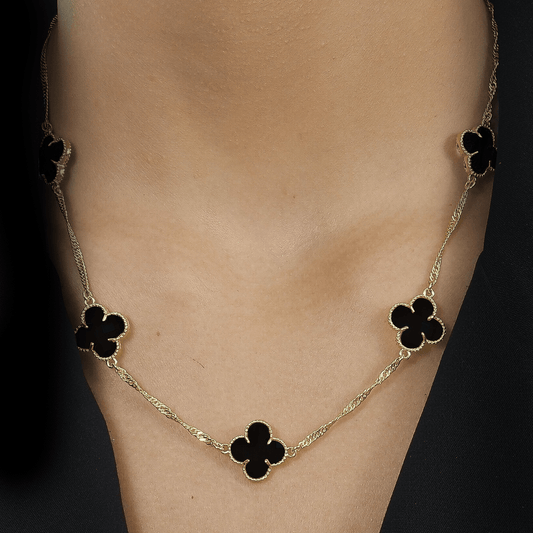 Conjunto com Trevos Pretos Dourados